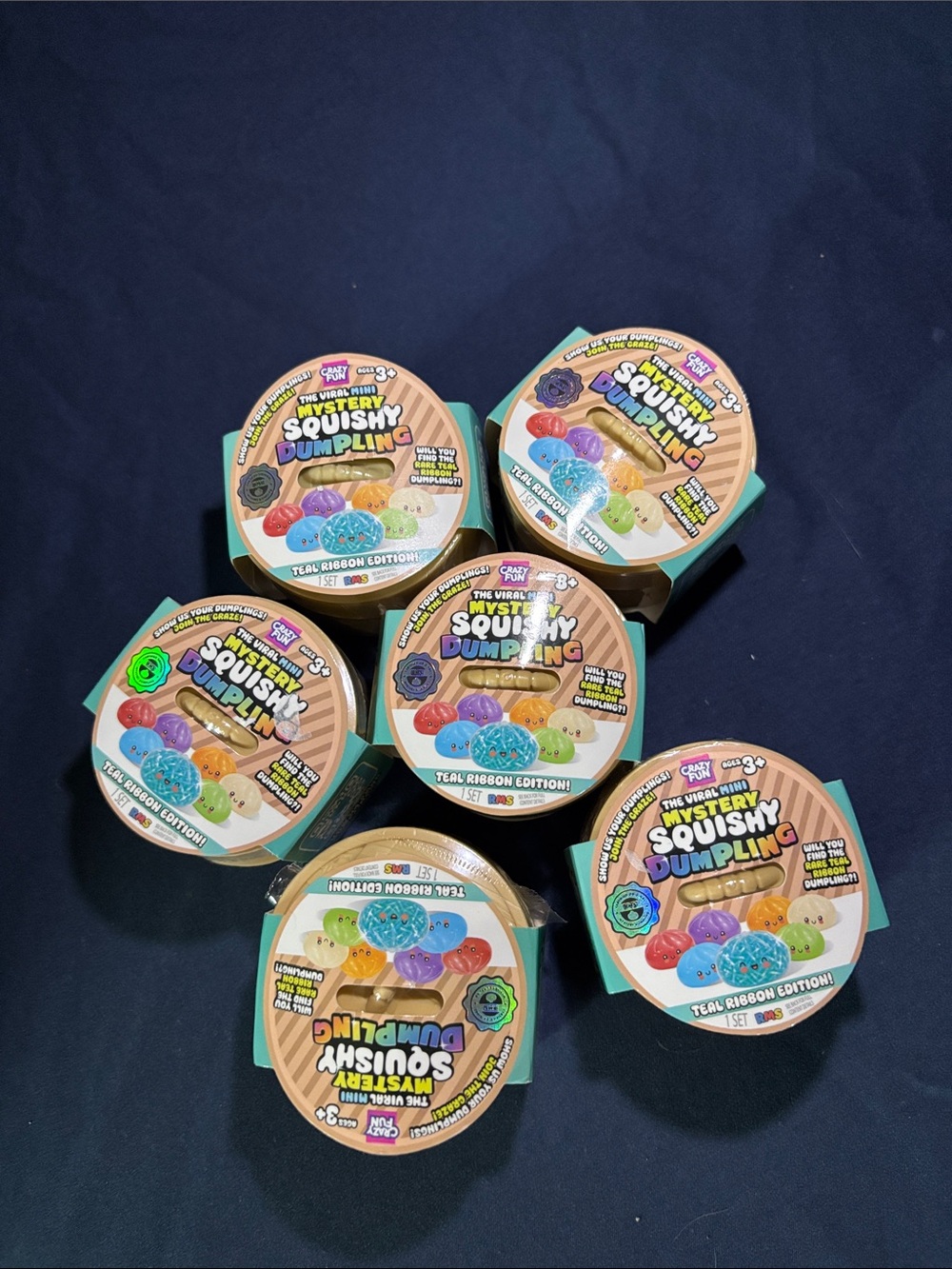 The viral MINI mystery squishy Dumpling teal ribbon edition Bundle ! Set of 6